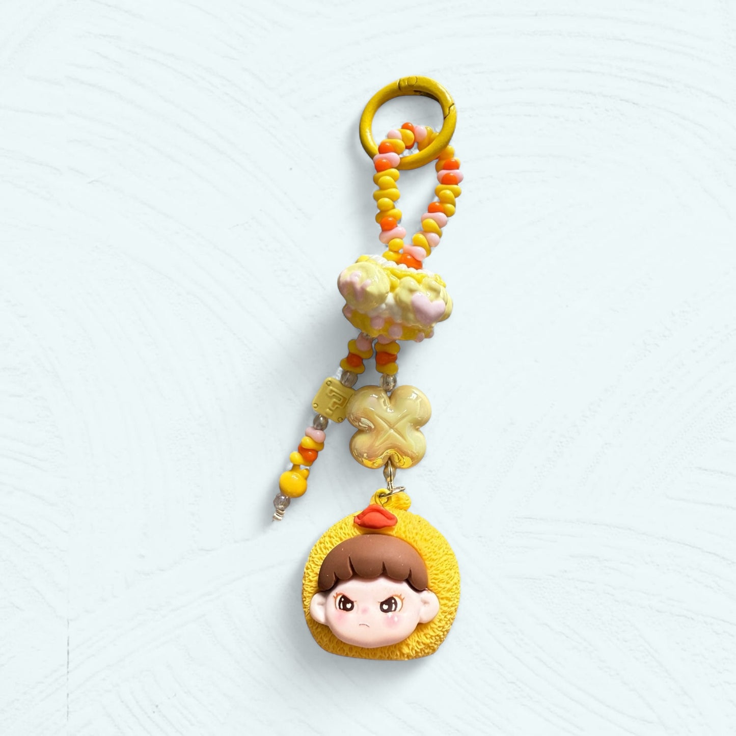 Bijou de sac & attache téléphone DORA – Figurines en costume animalier fait main