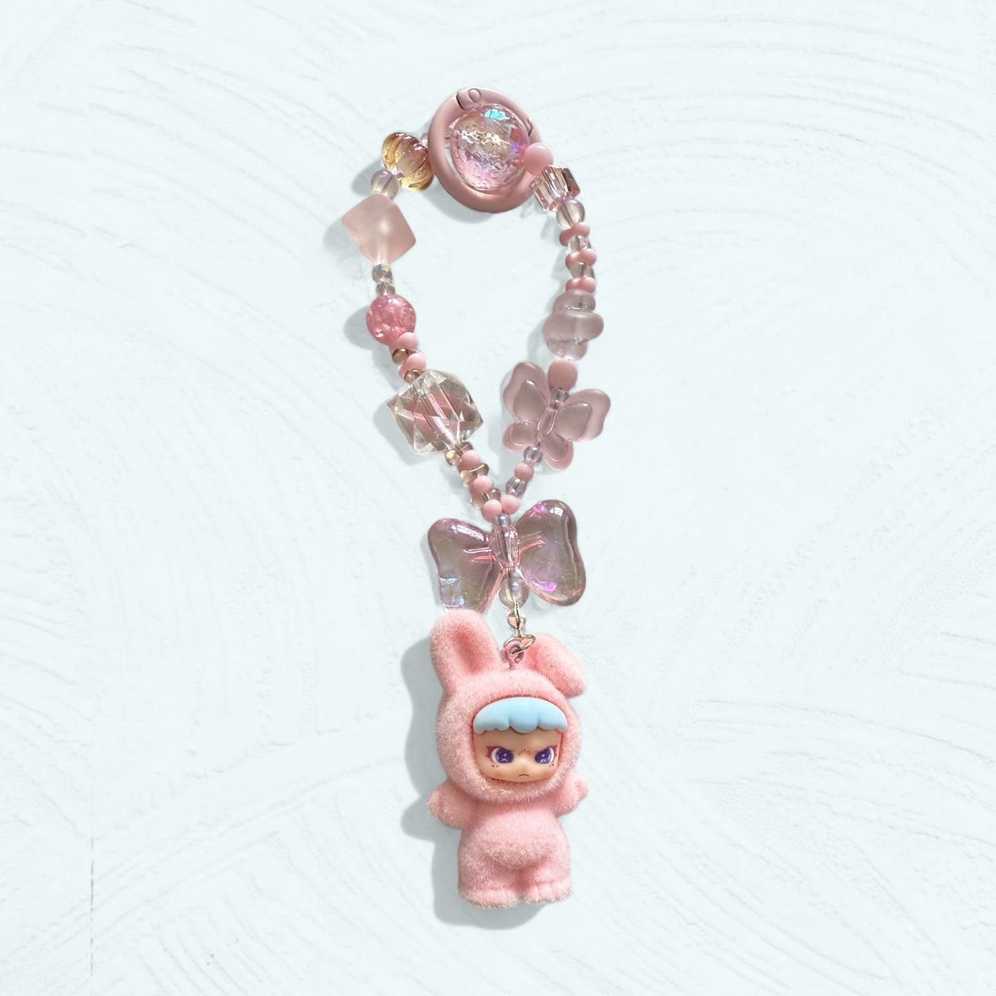 Attache téléphone & bijou de sac DORA – Costume lapin
