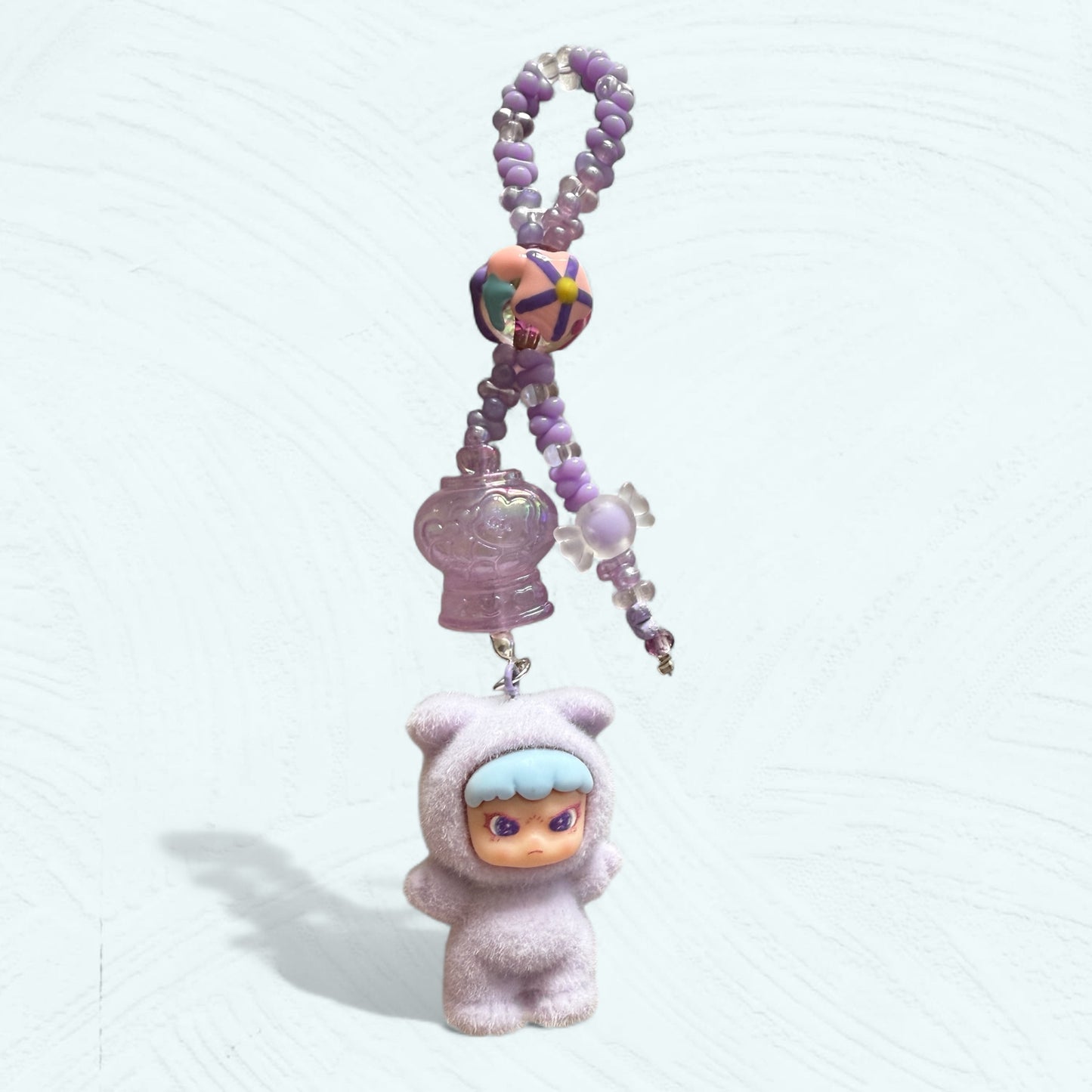 Attache téléphone & bijou de sac DORA – Costume lapin