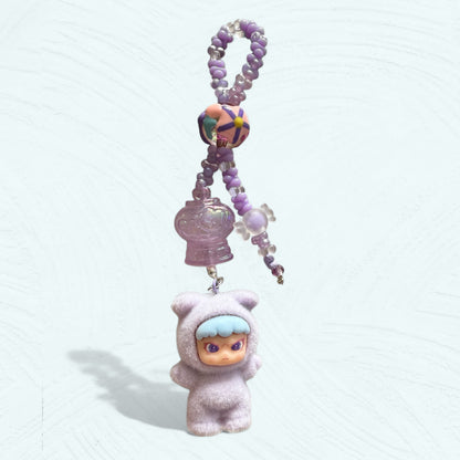 Attache téléphone & bijou de sac DORA – Costume lapin